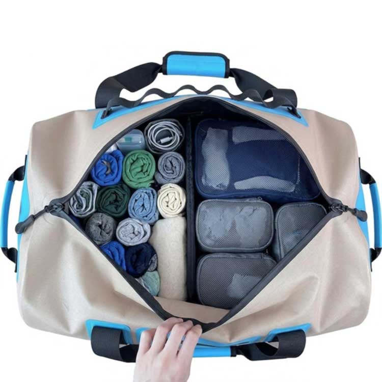 packedopen waterproof travel bag with rolled clothes and packing cubes